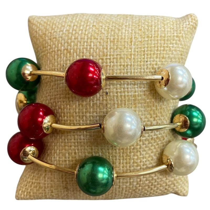 Set of three Christmas stretch bracelets with red, white, and green faux-pearl beads on gold wire.