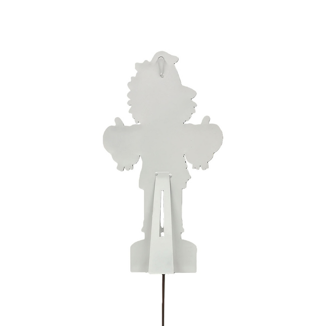 Back view of a white metal small scarecrow nutcracker with a stand and ground stake.