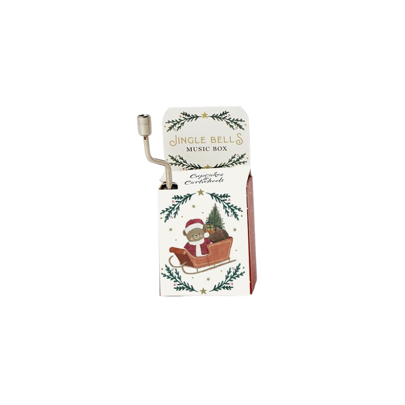 Hand-cranked Jingle Bells music box with a festive bear in a sleigh illustration.