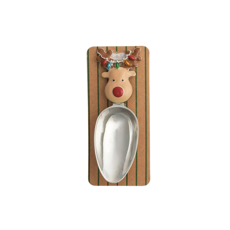 Stainless steel Christmas candy scoop with a reindeer enamel handle on a striped display card.