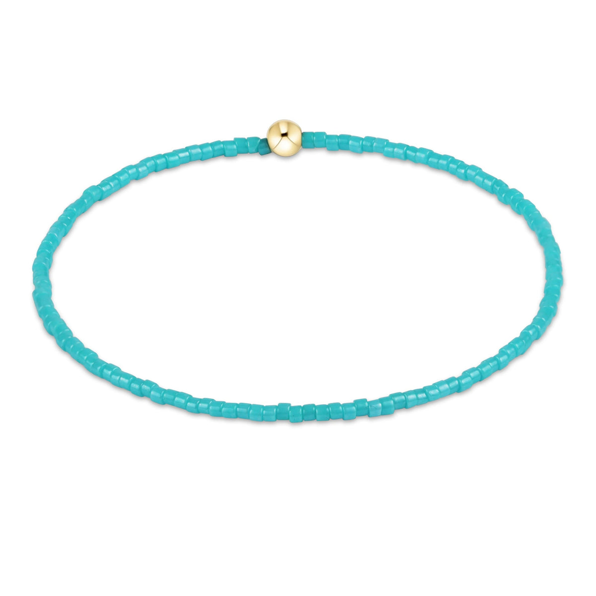 Hope Classic bracelet featuring a gold-filled bead with two rows of seed beads on stretch elastic.