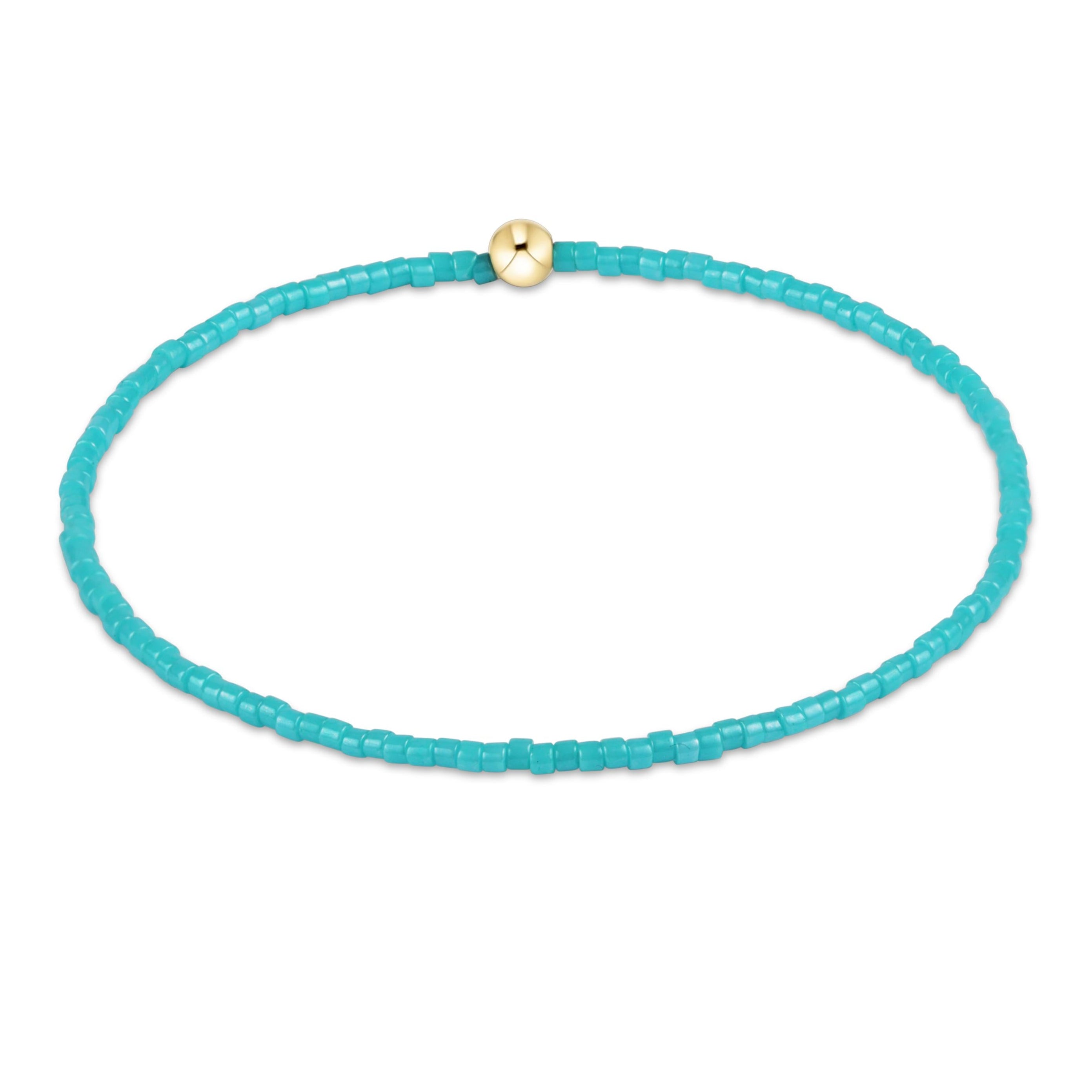 Hope Classic bracelet featuring a gold-filled bead with two rows of seed beads on stretch elastic.