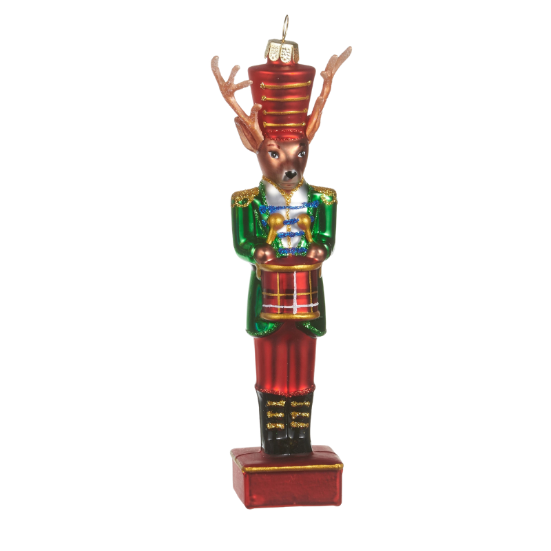 6.5-inch glass deer nutcracker ornament wearing a green jacket and red hat, playing a drum.