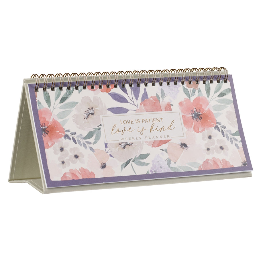 Undated weekly planner with 'Love Is Patient Love Is Kind' text on a white cover.