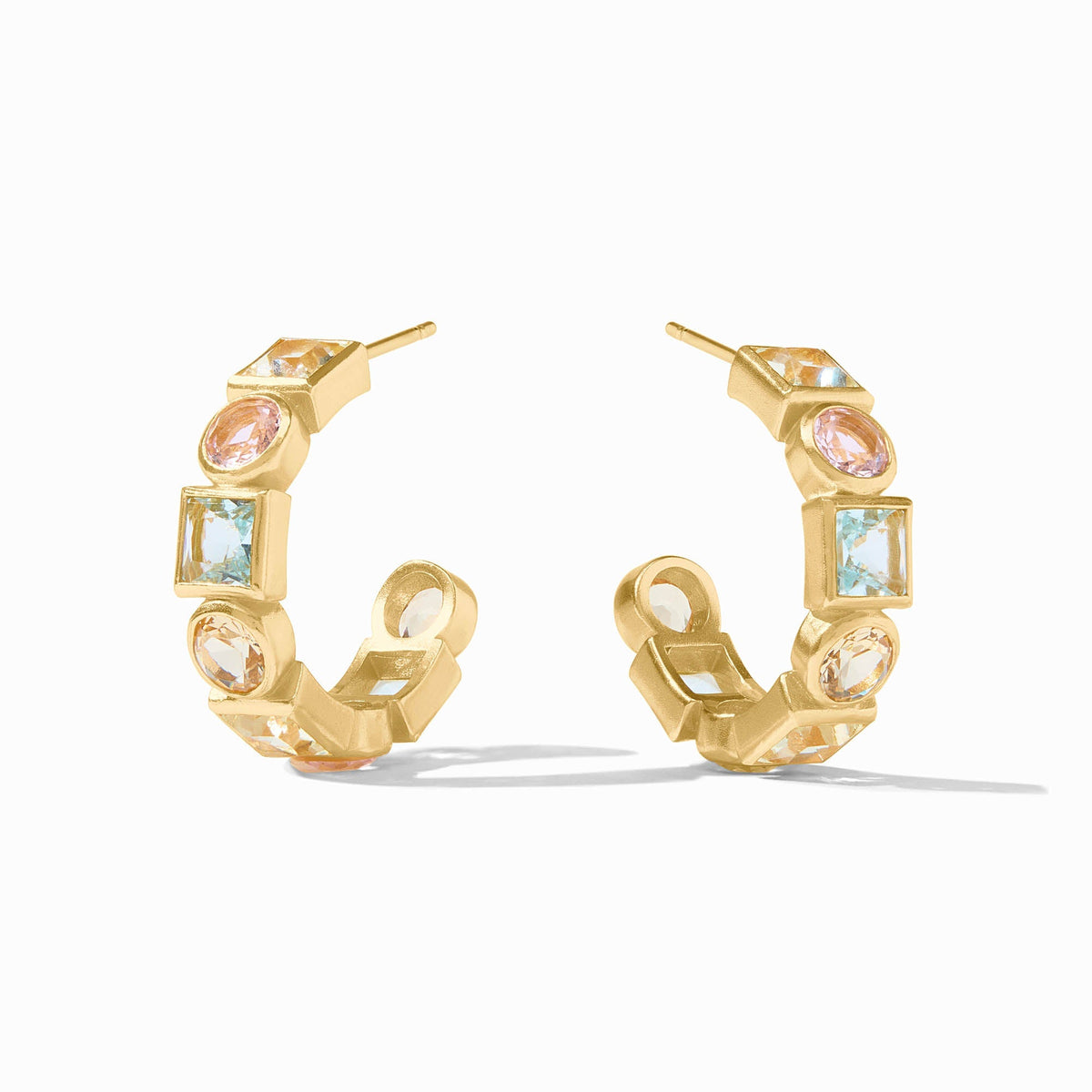 Jolie Hoop earrings featuring a one-inch length with imported glass stones set in 24K gold-plated metal.