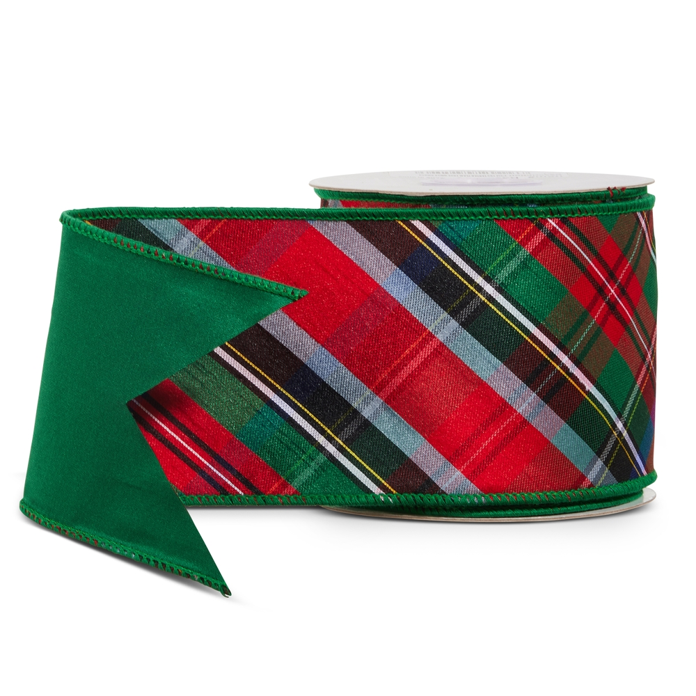 4 inch wide red and green tartan plaid wired ribbon on a spool with a solid green backing.