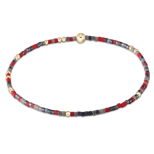 Hope Unwritten bracelet featuring mixed 2mm seed beads in various colors with gold-filled accents on elastic cord.