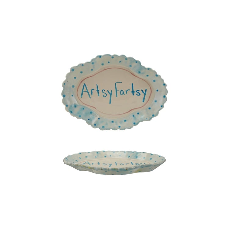 Hand-painted stoneware scalloped platter with blue polka dots and "Artsy Fartsy" text.