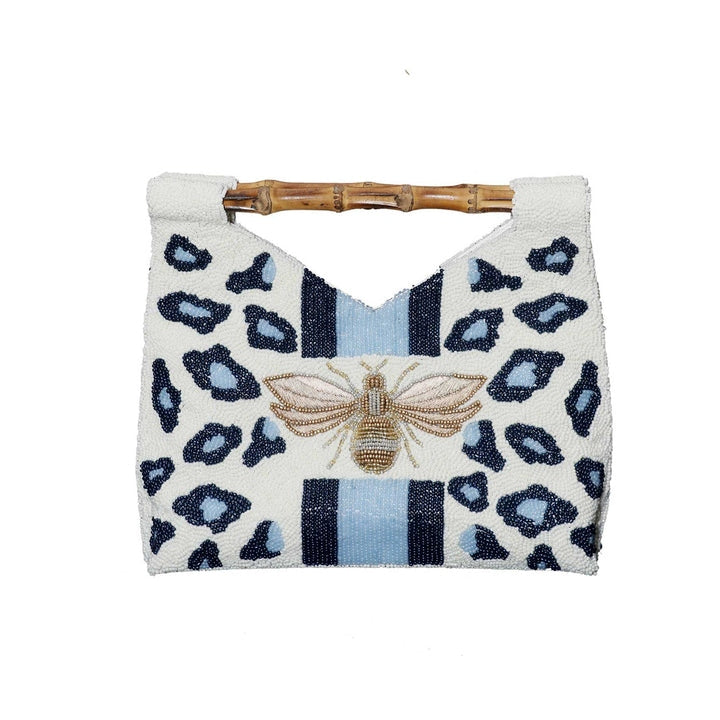 Blue Bee Beauty Beaded Clutch with leopard print, central bee motif, and bamboo handle.