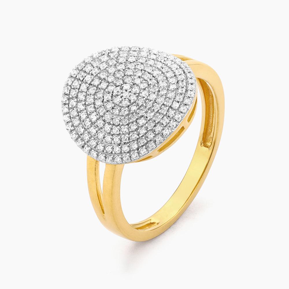 Silver round statement ring with a central diamond accent
