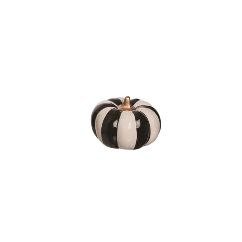 Small ceramic pumpkin with vertical black and white stripes and a gold stem.