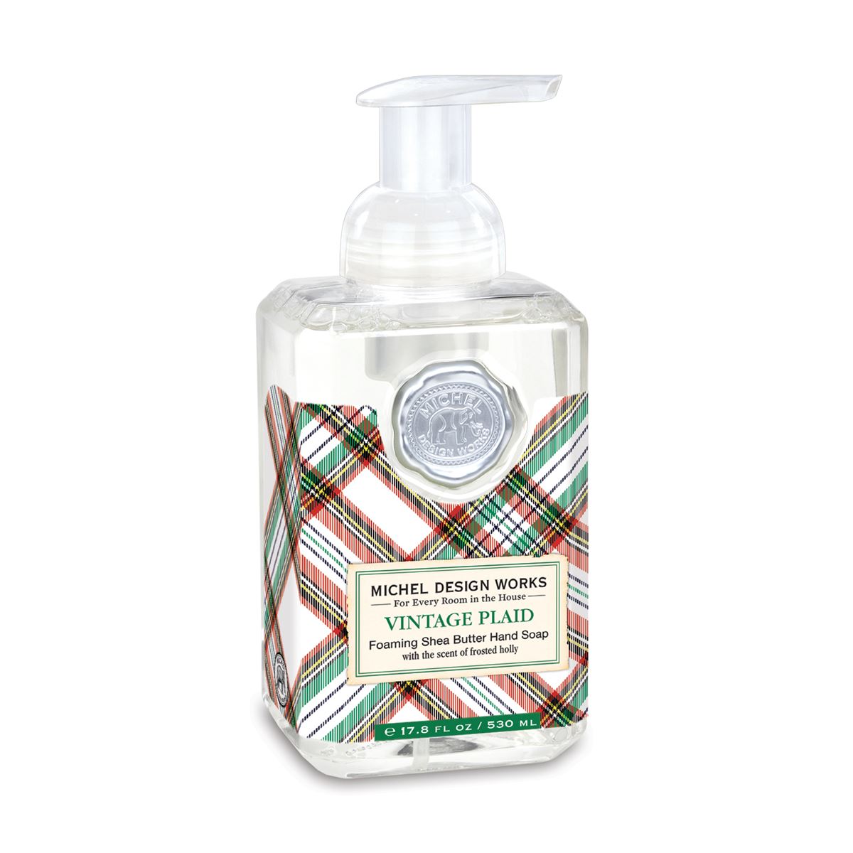 Foaming hand soap dispenser in a clear bottle with white liquid.