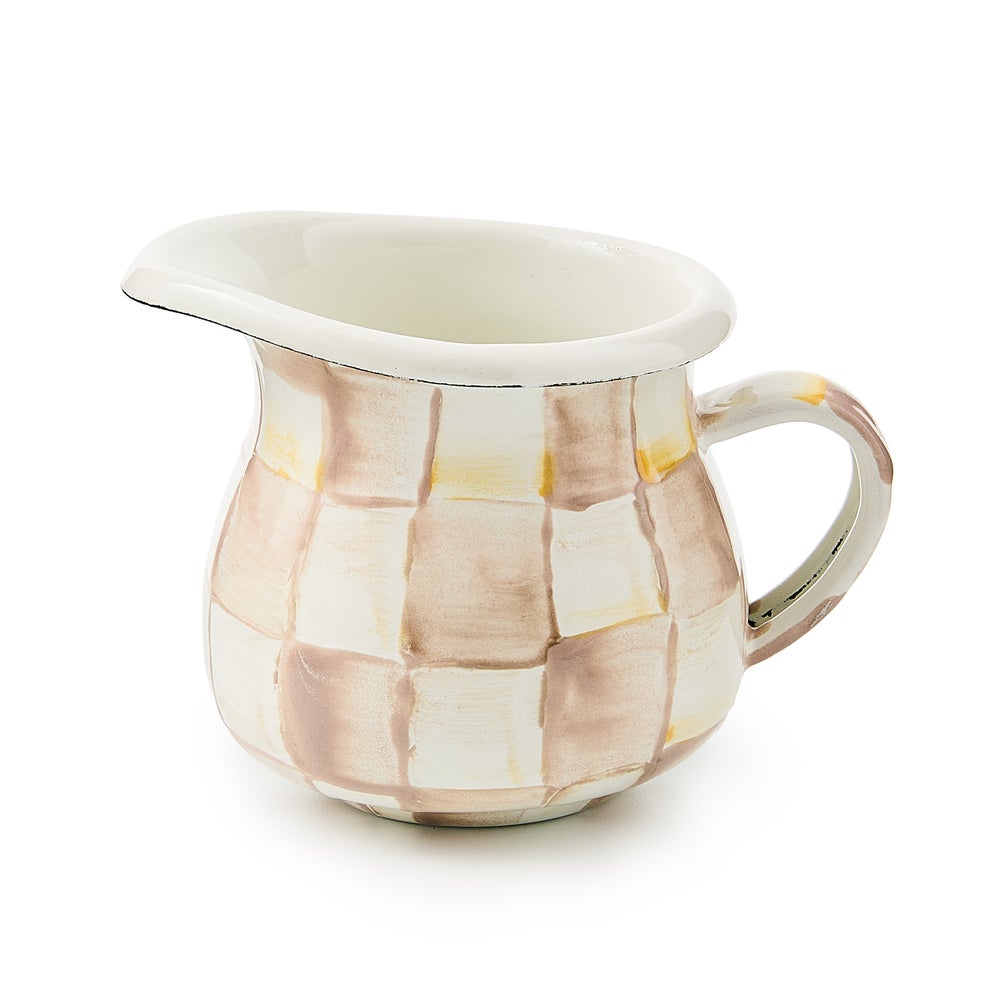 Hand-glazed steel creamer with mocha checkered hand-painted pattern