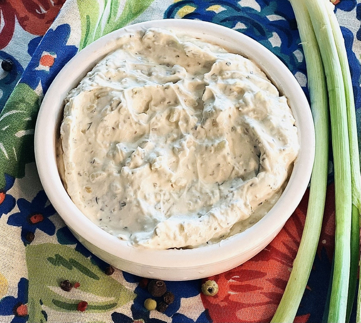 Jar of JR's Ranch Dip with black pepper and garlic spices