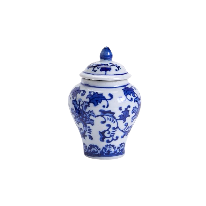 Mini blue and white porcelain ginger jar with floral patterns and a matching lid.