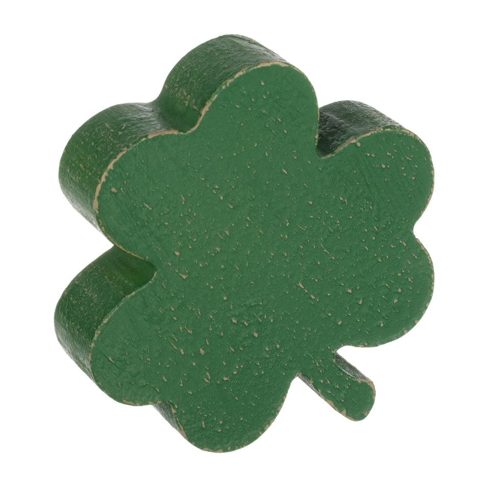 Small dark green wooden shamrock cutout measuring three and a quarter inches wide.