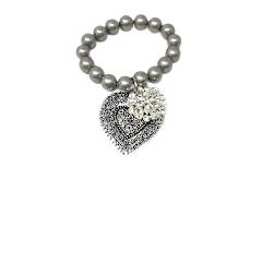 Chunky stretch bracelet with silver-tone heart charm and rhinestone flower pendant