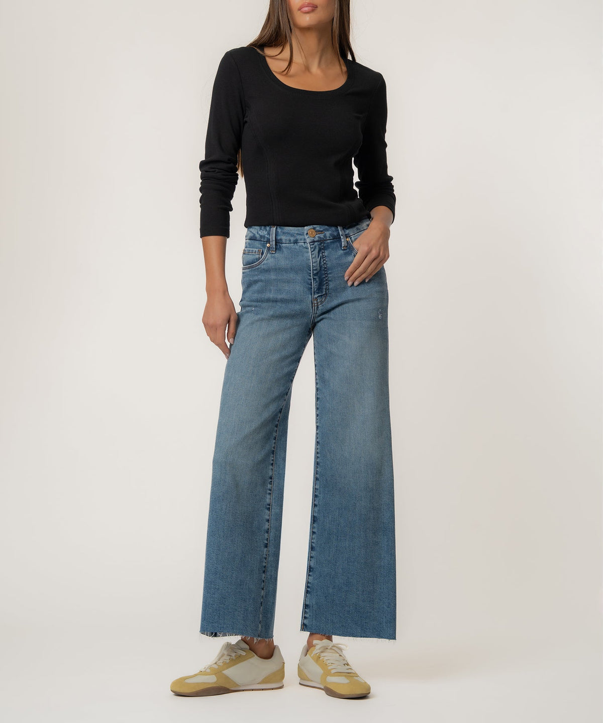 Women's Meg high-rise wide-leg raw hem pants in natural cotton fabric with a relaxed silhouette.