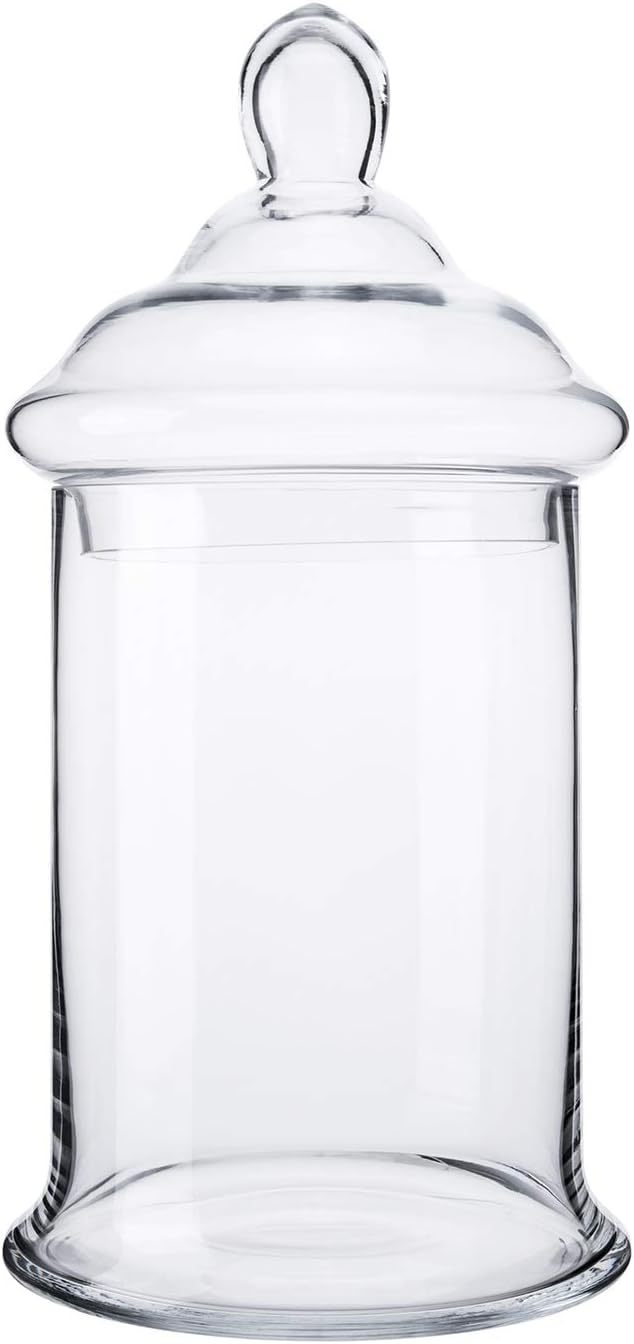 Clear glass apothecary jar with lid measuring 6.5 inches wide by 13 inches tall.