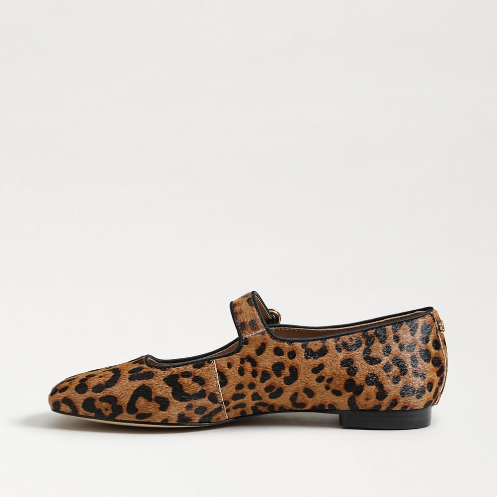 Side view of a leopard print Michaela Mary Jane flat with a pointed toe and buckle strap.