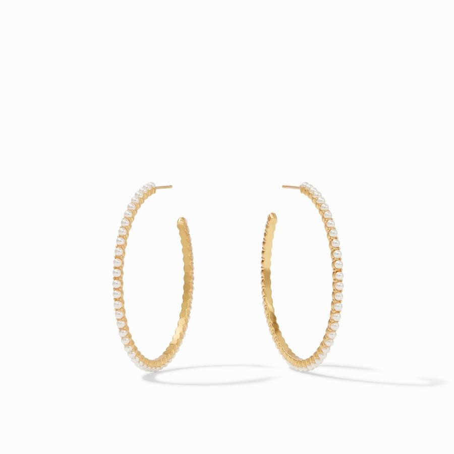Delicate Juliet hoop earring in gold with pearl accents.