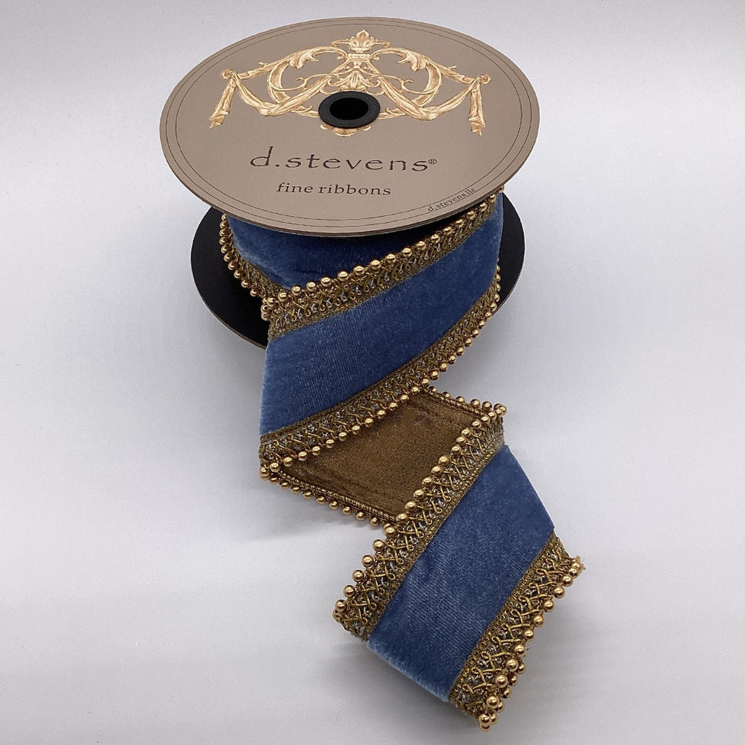 2.5 inch blue velvet ribbon with antique gold bead trim on a d.stevens spool.