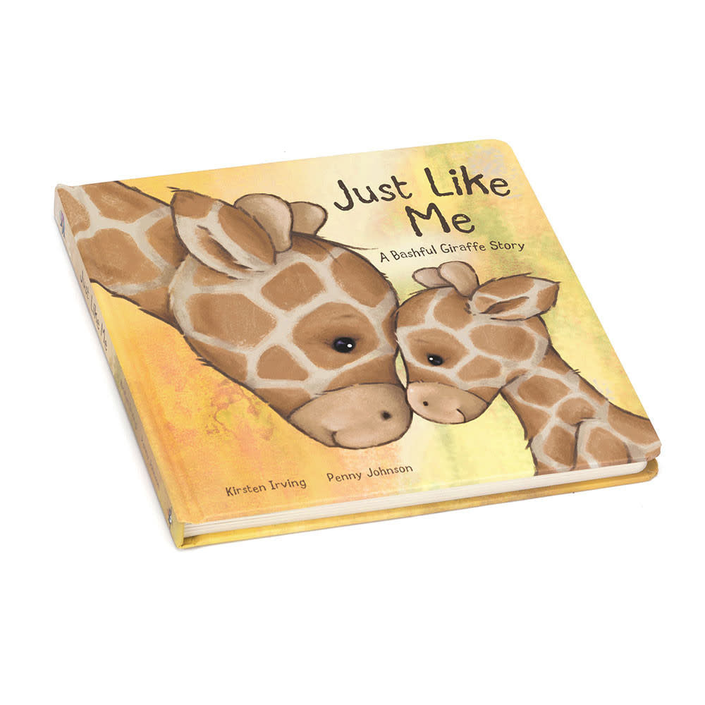Hardcover children's book 'Just Like Me' featuring a bashful giraffe on the cover.