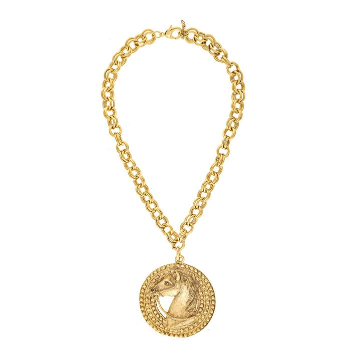 Stetson gold double-link chain necklace with a round horse medallion pendant.