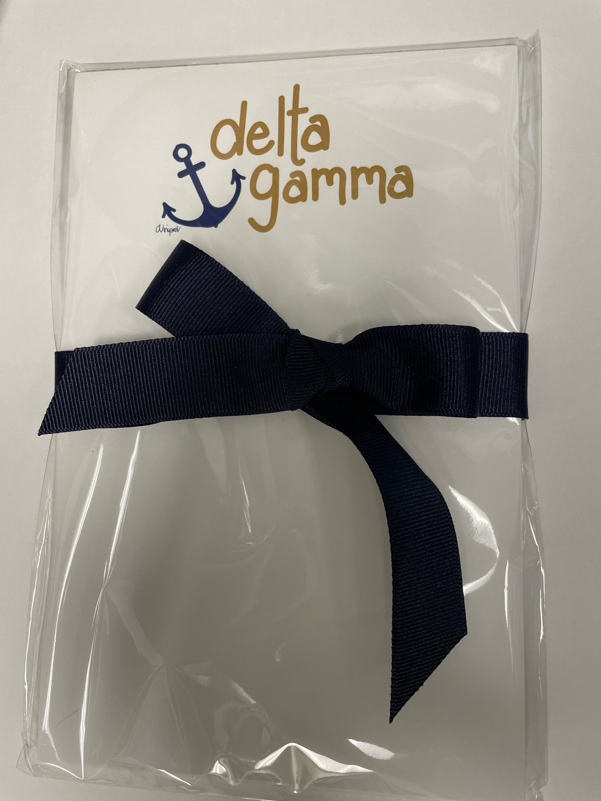 White Sorority Notepad with resealable clear cellophane sleeve packaging