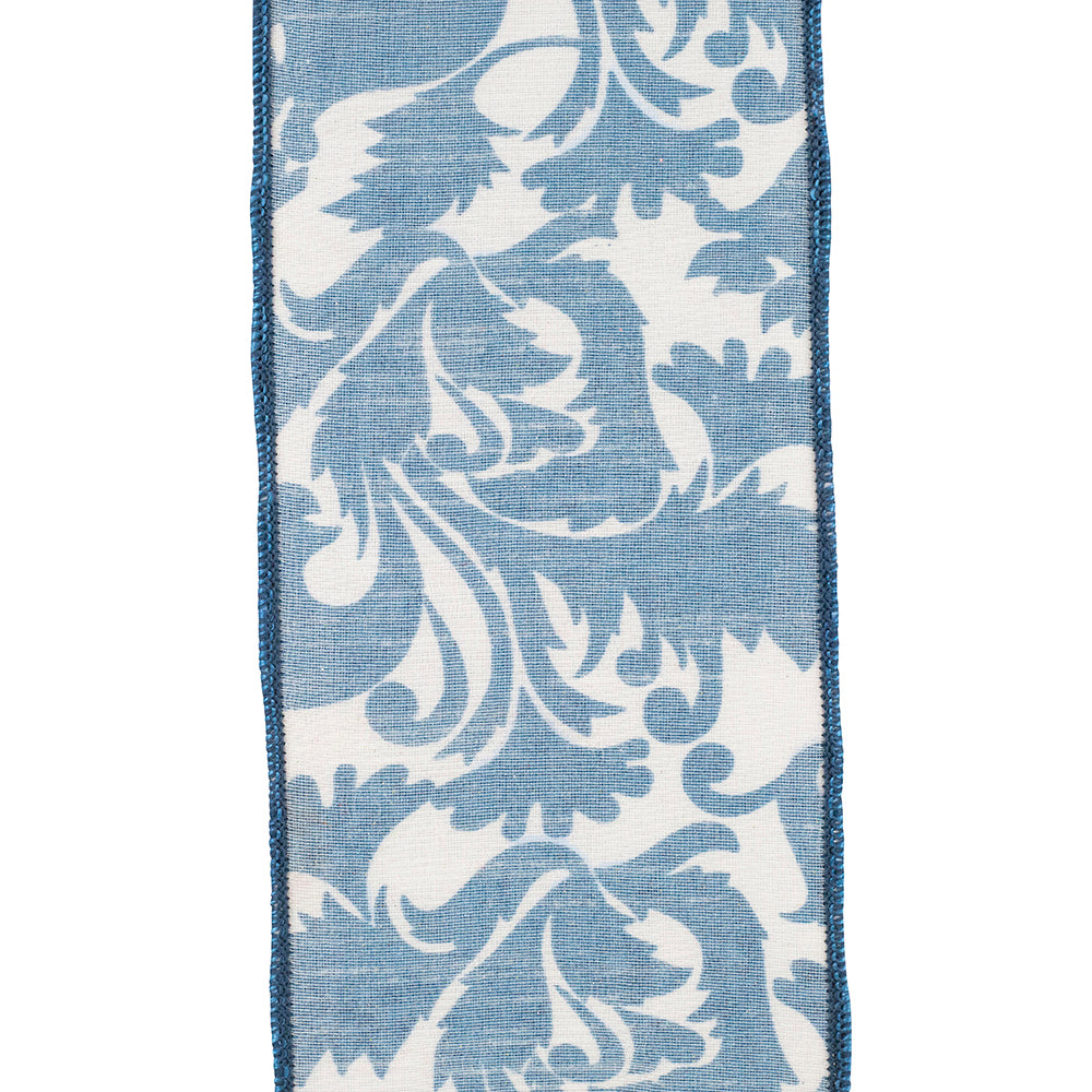 Four-inch wide blue wired-edge polyester ribbon with a scroll leaf pattern.