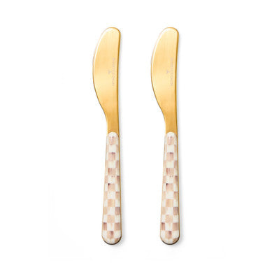 Two stainless steel bistro spreaders with a simple handle shape.