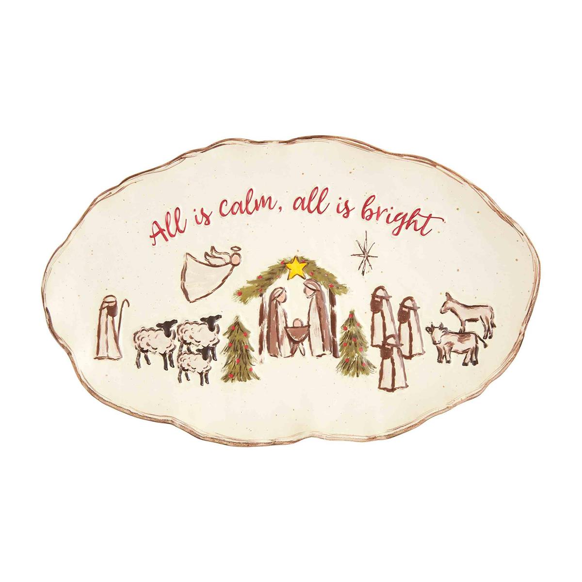 Stoneware Nativity platter featuring a relief scene with figures in earth tones on an oval shape.
