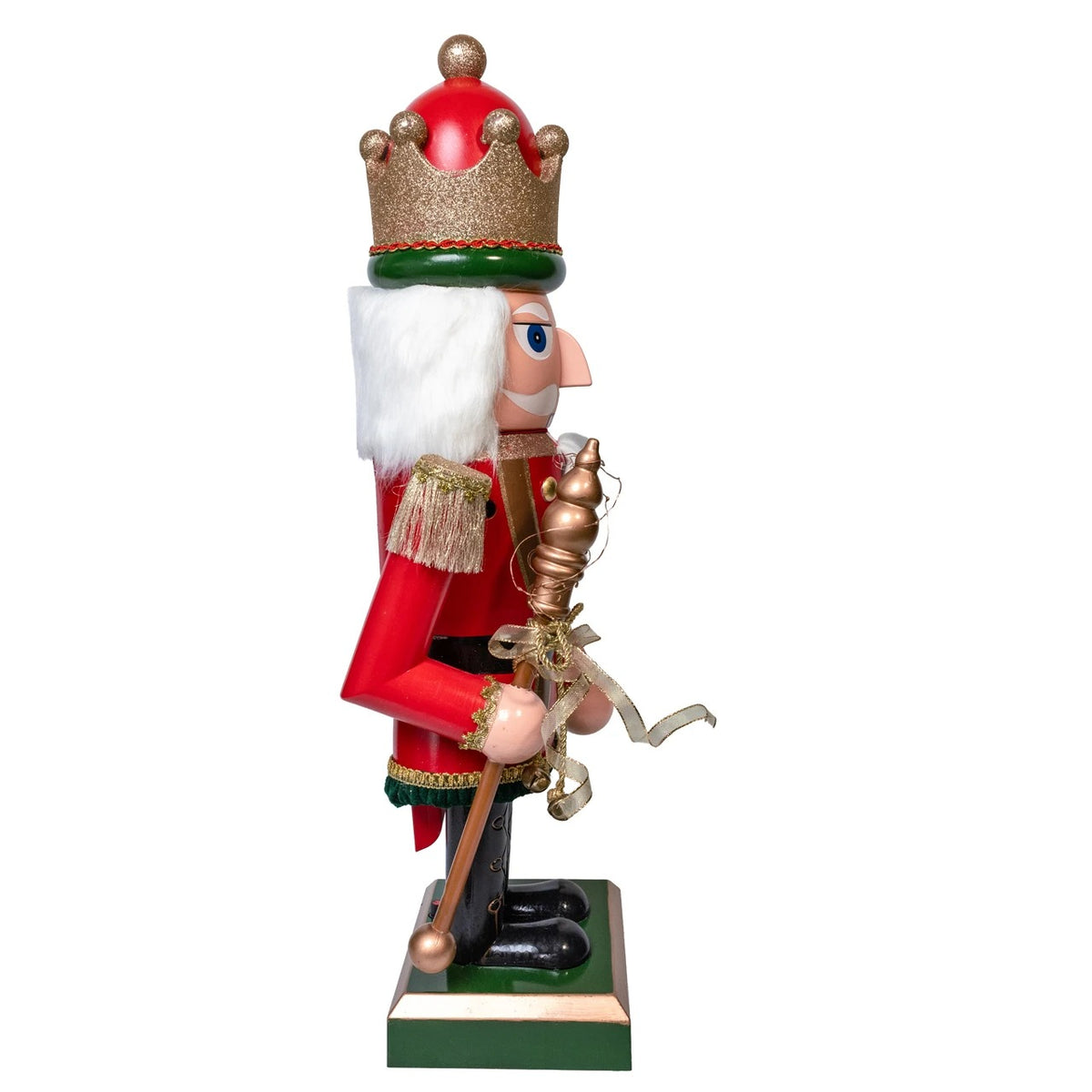 Side view of a 43-inch red and gold musical nutcracker holding a scepter on a green base.