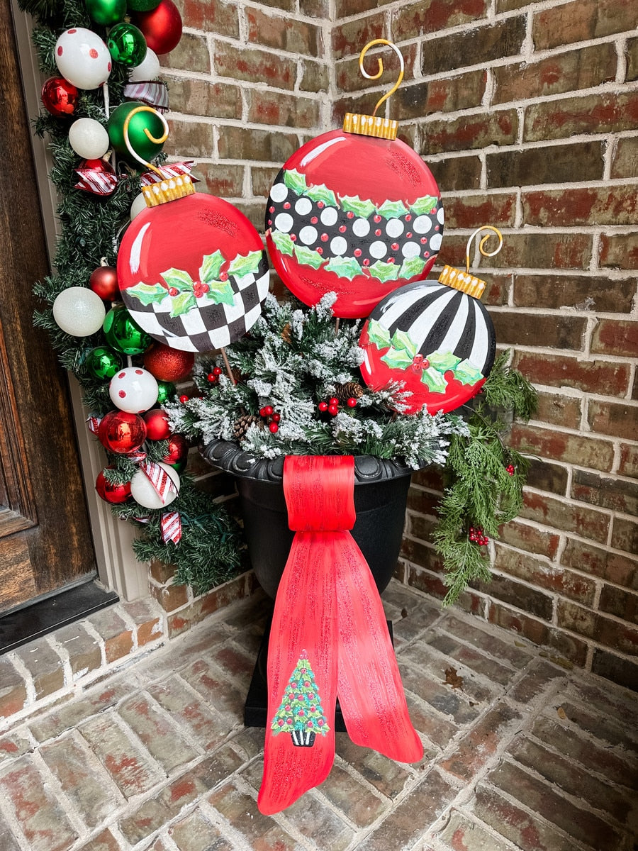 Elegant Dot Ornament stake with a white finish featuring black dot patterns on its vertical surface.