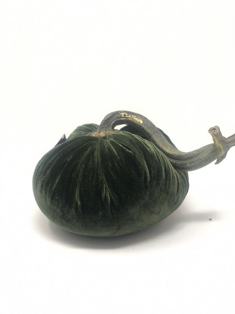 Handmade orange velvet pumpkin with a natural stem.