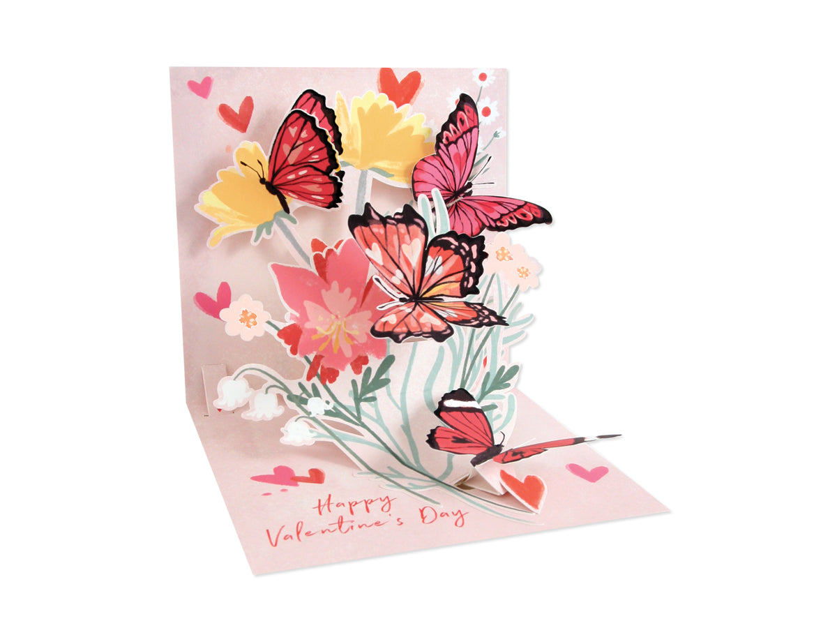 White envelope with red foil finish featuring a heart flutter card inside.