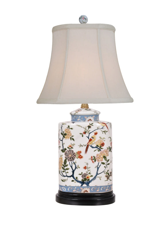 Oval porcelain urn lamp with European floral relief patterns in a soft neutral tone.