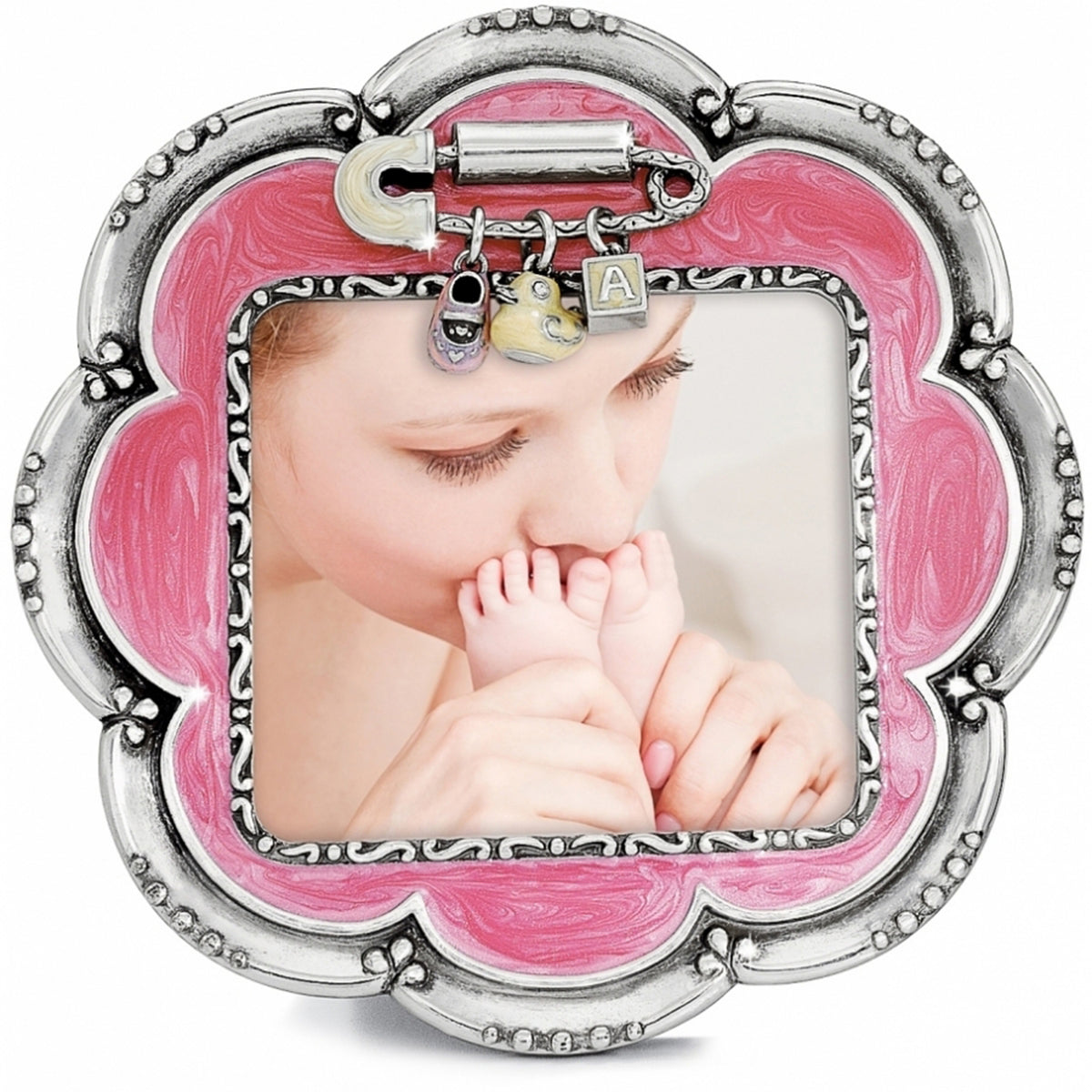 Pink enamel square frame with a flower motif holding a small photo.