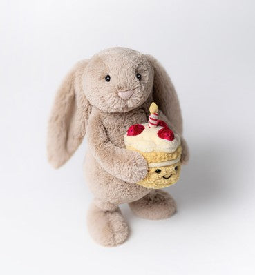 Sitting Bashful Beige Bunny plush toy with hard eyes made from polyester fabric.