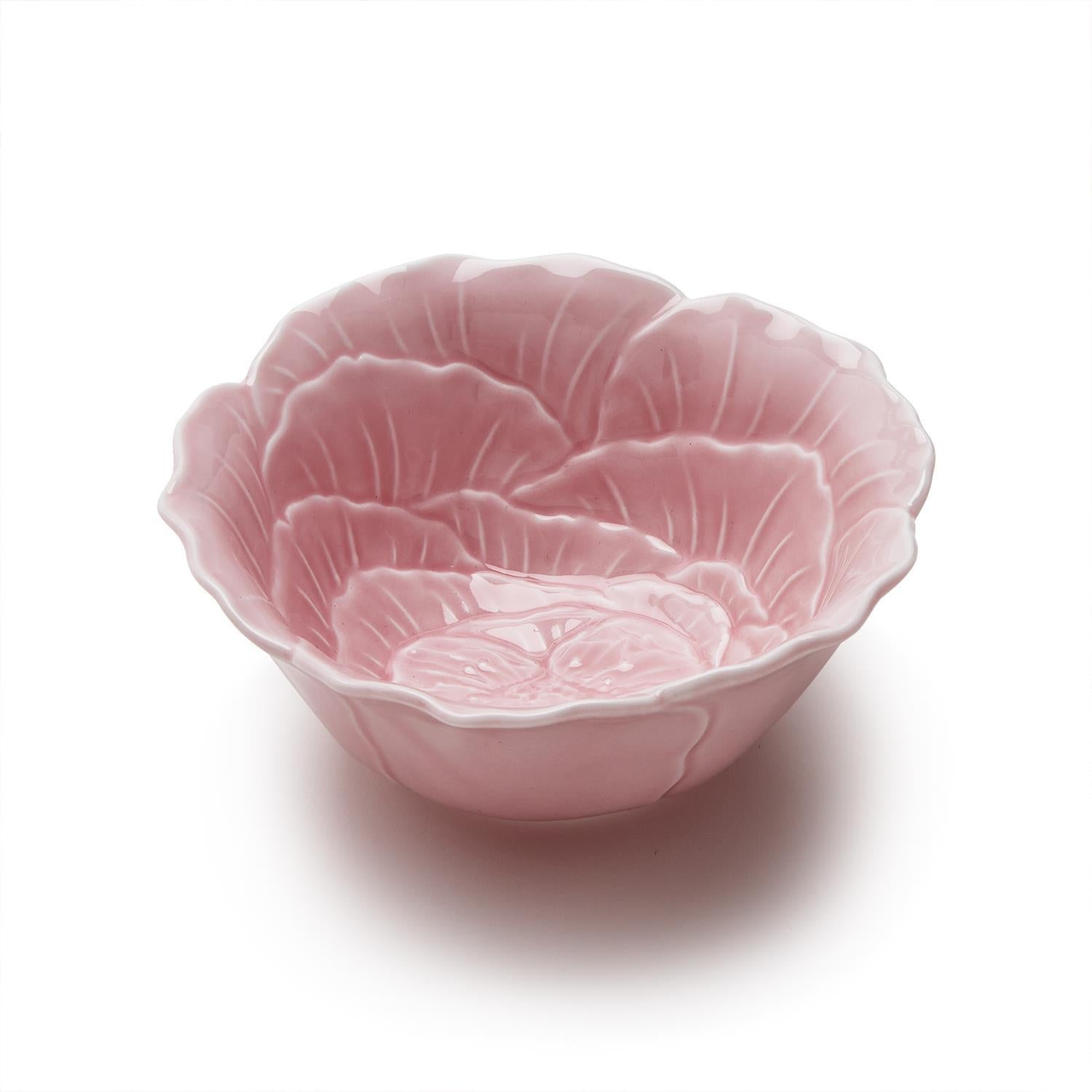 Porcelain flower-shaped bowl with a delicate petal rim detail.