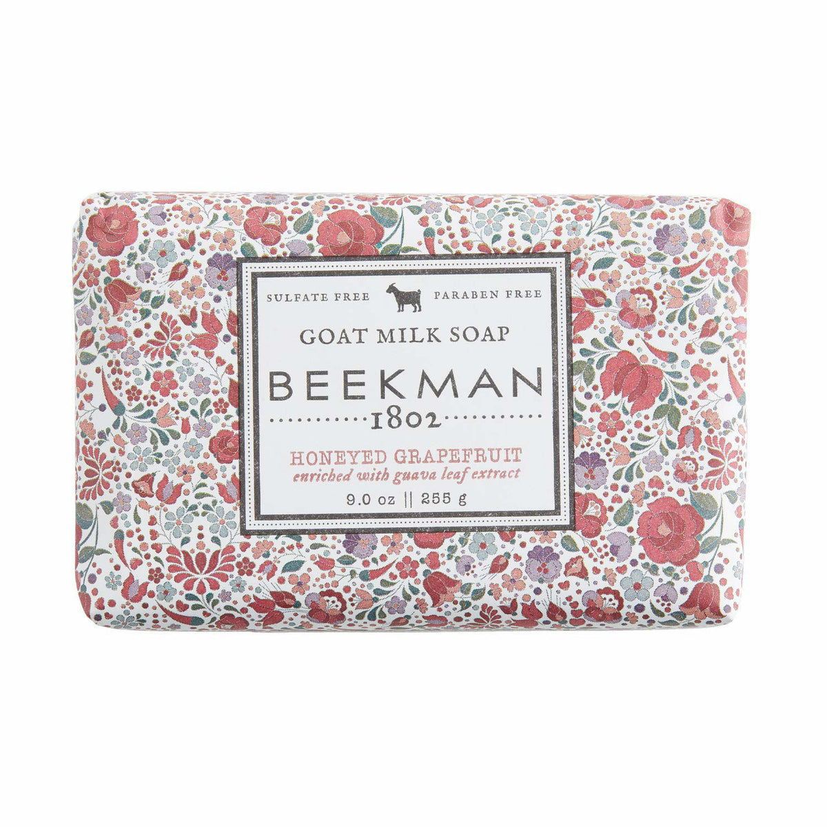 Triple-milled bar soap with a creamy off-white color featuring embedded speckles from goat milk and vegetable base ingredients.