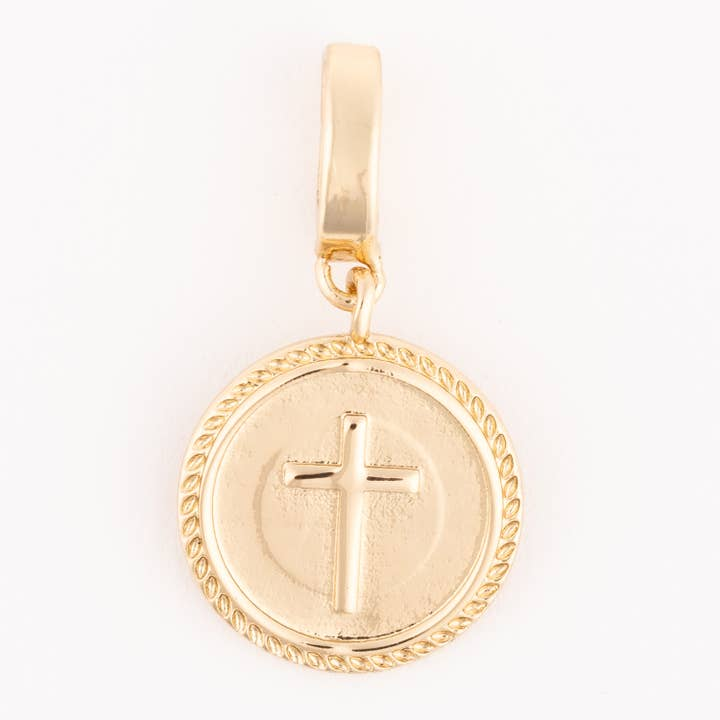 Gold Sophie Cross Coin charm featuring a raised cross on a circular medallion with a rope border.