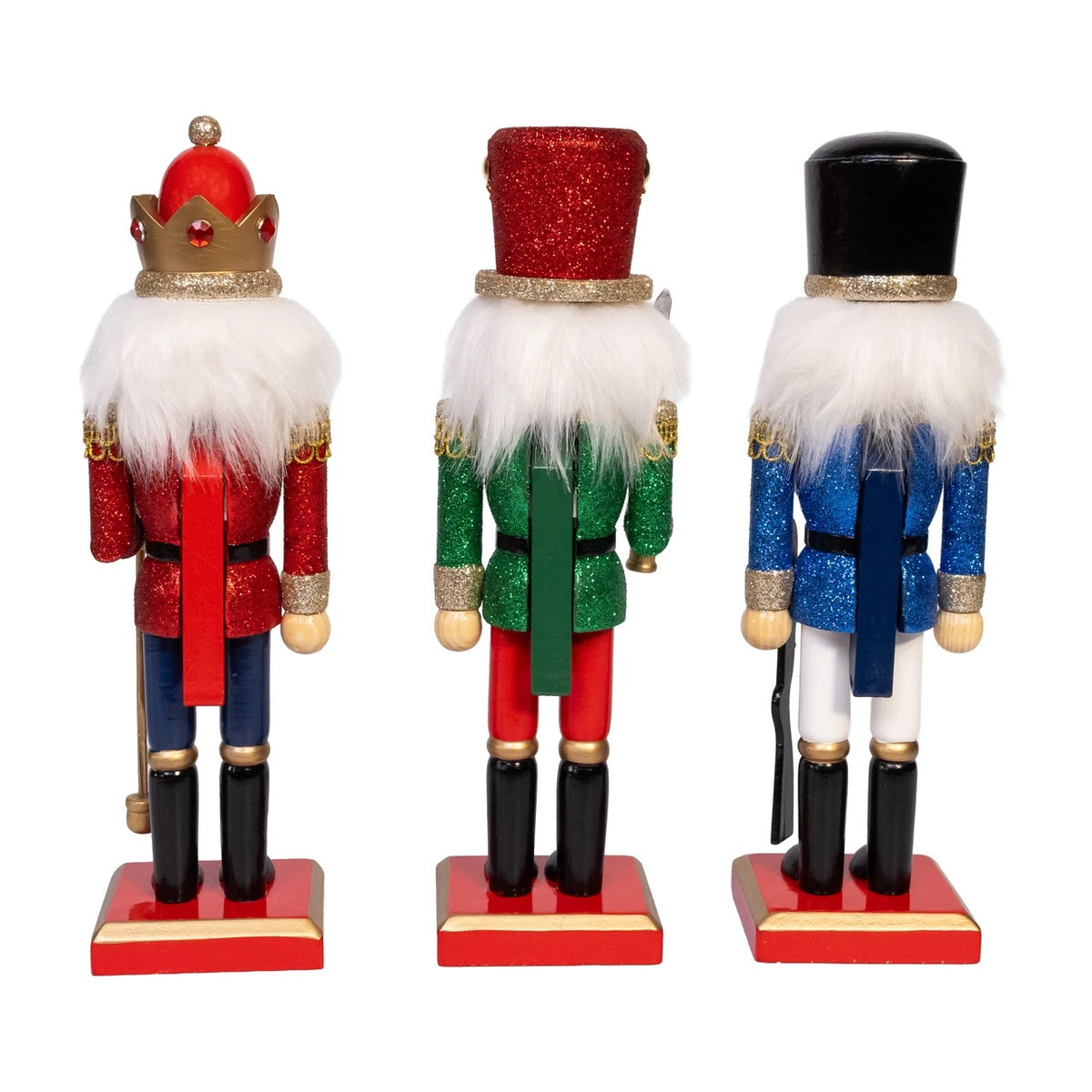 Back view of three 10-inch wooden nutcrackers in red, green, and blue with glittery finishes.