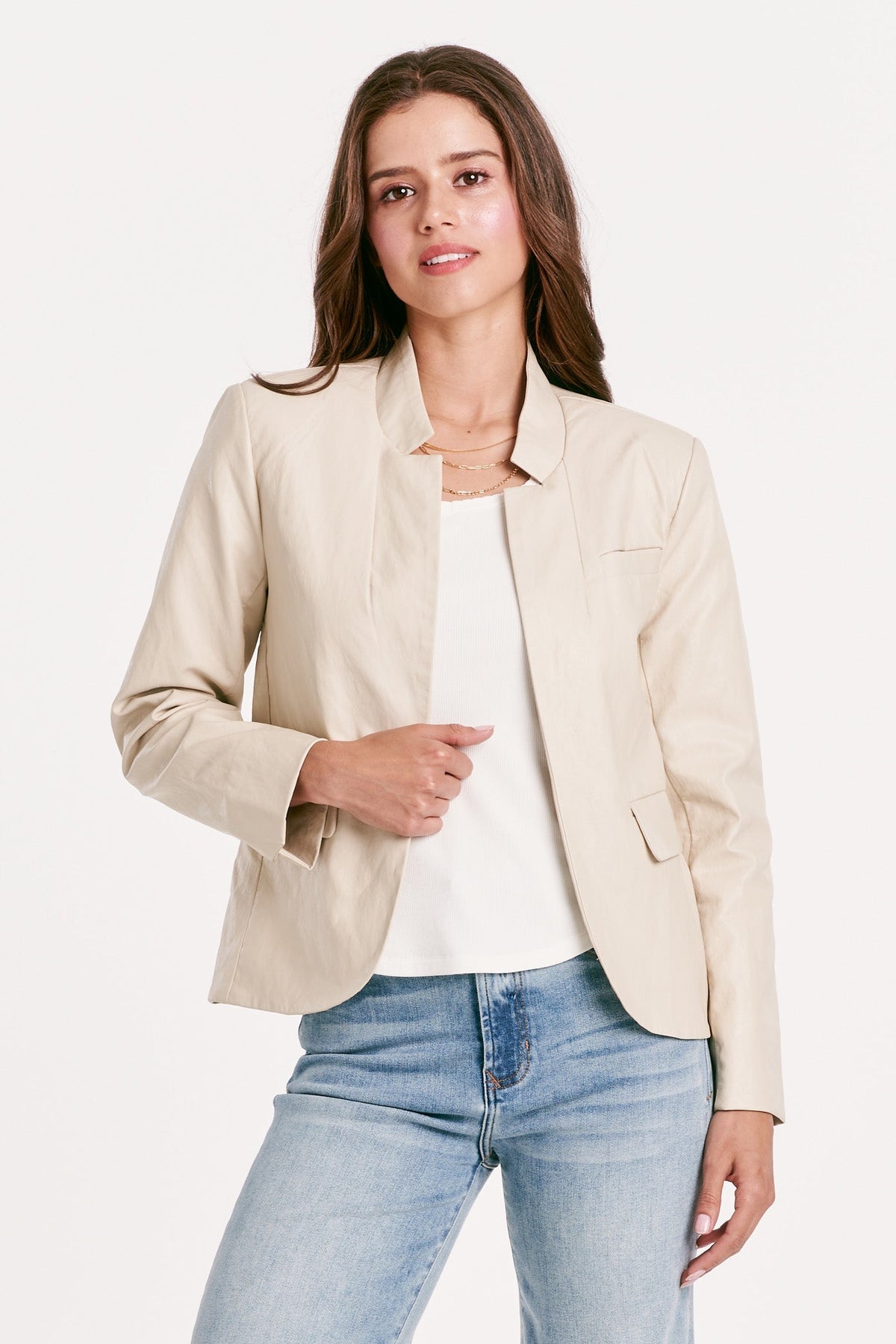 Jane Trinity blazer jacket in vegan leather with a structured fit.