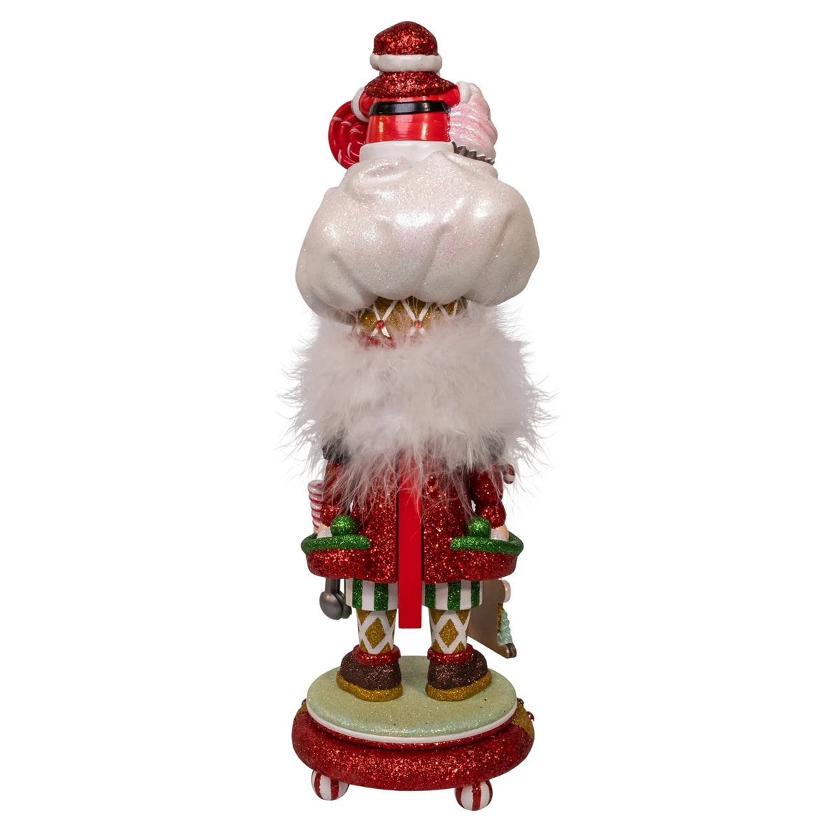 Back view of an 18-inch Hollywood Sweet Treats Nutcracker with a glittery red coat and white hat.