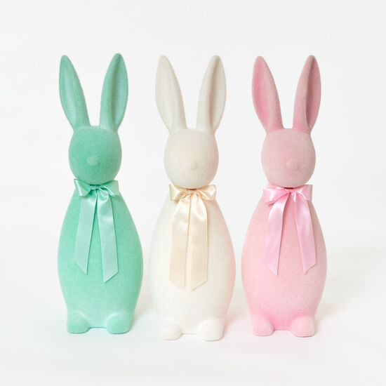 Twenty-seven inch flocked pastel button nose bunny figurine made of PVC with a soft matte finish.