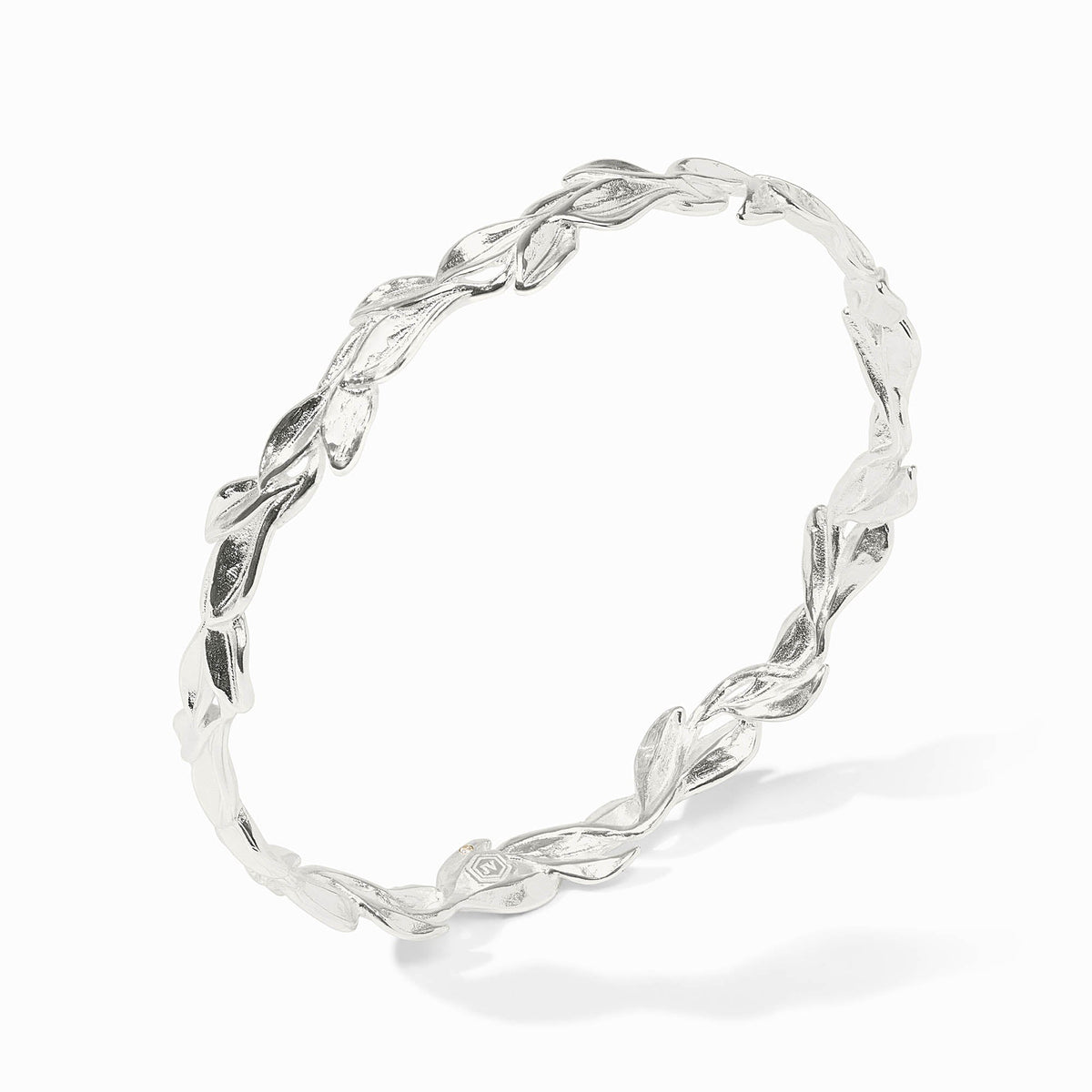 Willow bangle bracelet in silver metal with a delicate leaf pattern.
