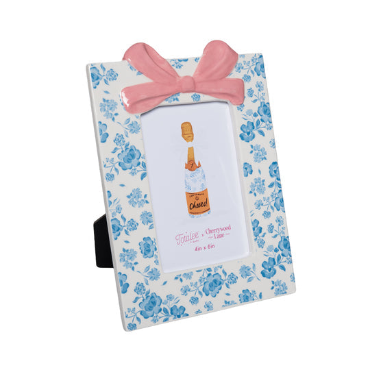 Blue ceramic photo frame with floral pattern