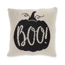 20 inch cream cotton knit pillow featuring a black pumpkin with the word BOO! in the center.