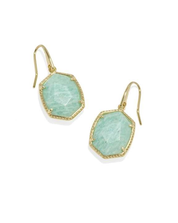 Daphne gold frame drop earrings with carved stones and hoofprint detailing on earwire closure.